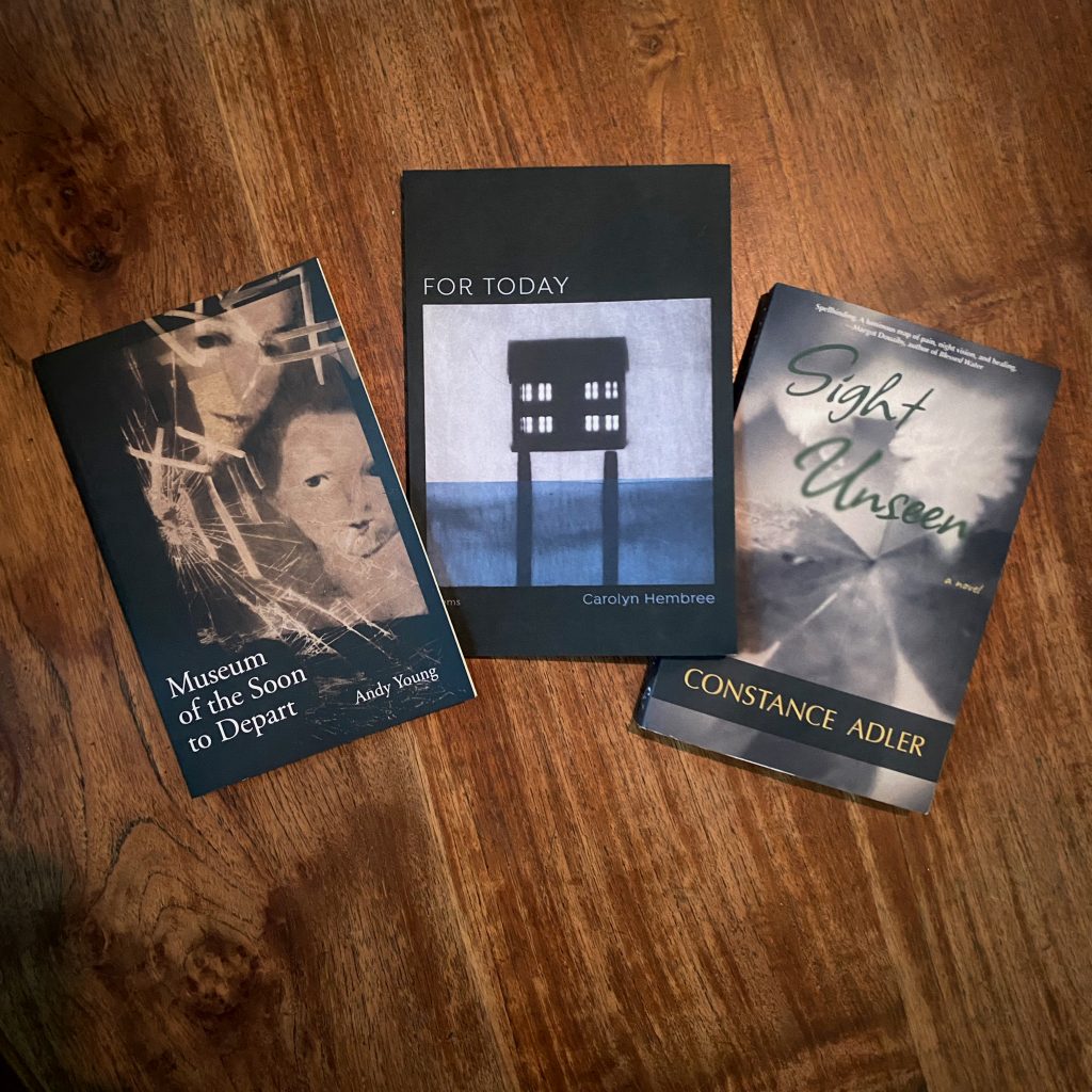 Three books arrayed on a table: Museum of the Soon to Depart by Andy Young, For Today by Carolyn Hembree, and Sight Unseen by Constance Adler. Each uses a photograph as cover art.